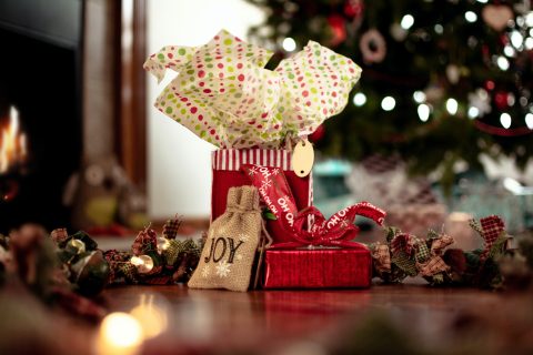 Christmas Gifts for Health Conscious Friends: Pile of wrapped Christmas gifts